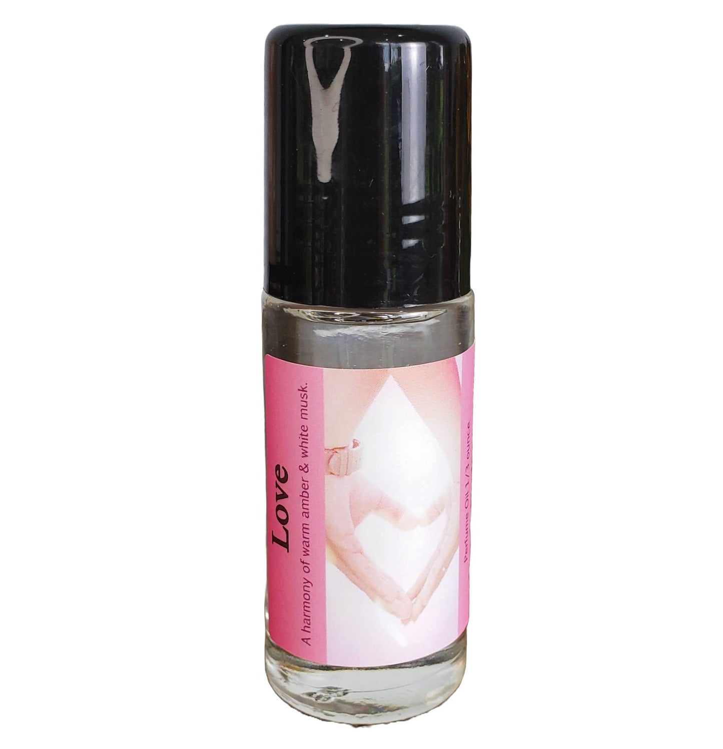 large one ounce bottle of love perfume oil on a white background