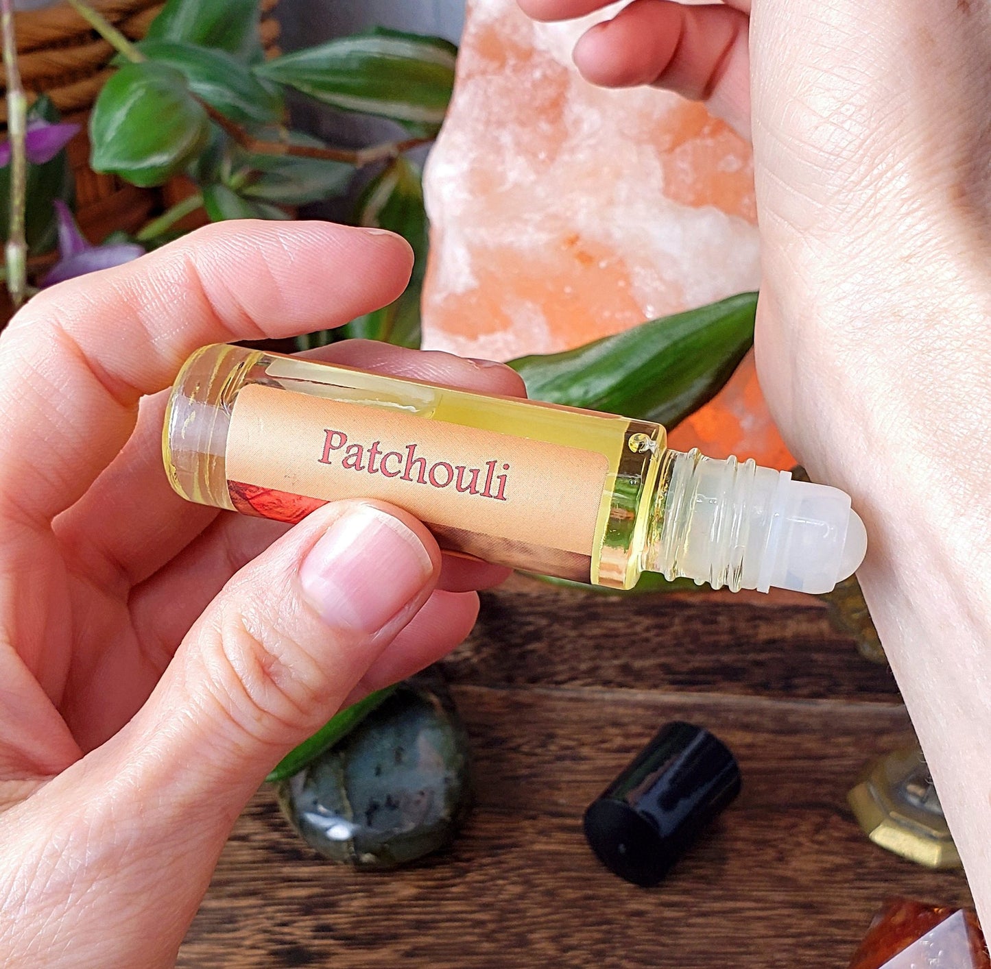 patchouli perfume oil roll-on on wrist