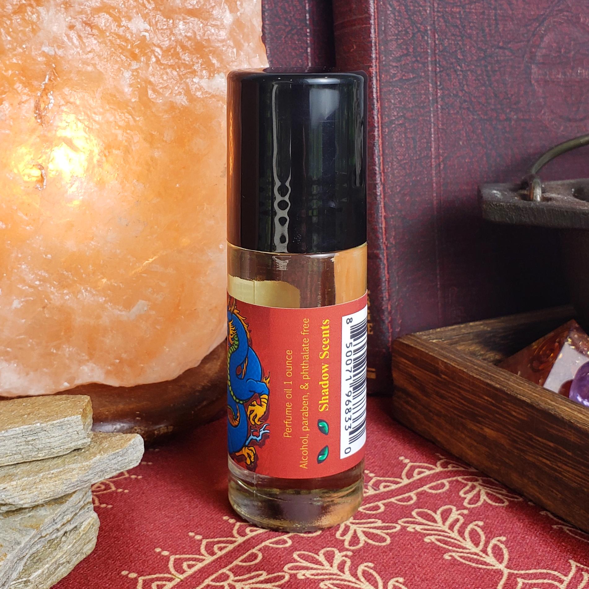 the back of the label for the dragon's blood one ounce perfume oil, showing the size and ingredient details with barcode