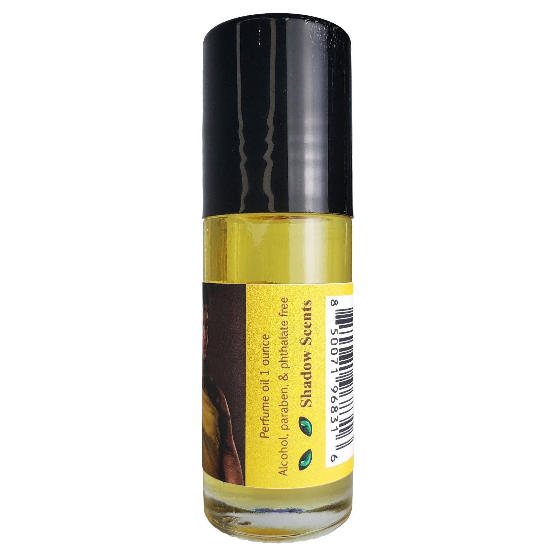 A 1 ounce roll-on bottle of Shadow Scents egyptian queen perfume oil, featuring a black cap and a yellow label with a barcode, set against a plain white background.