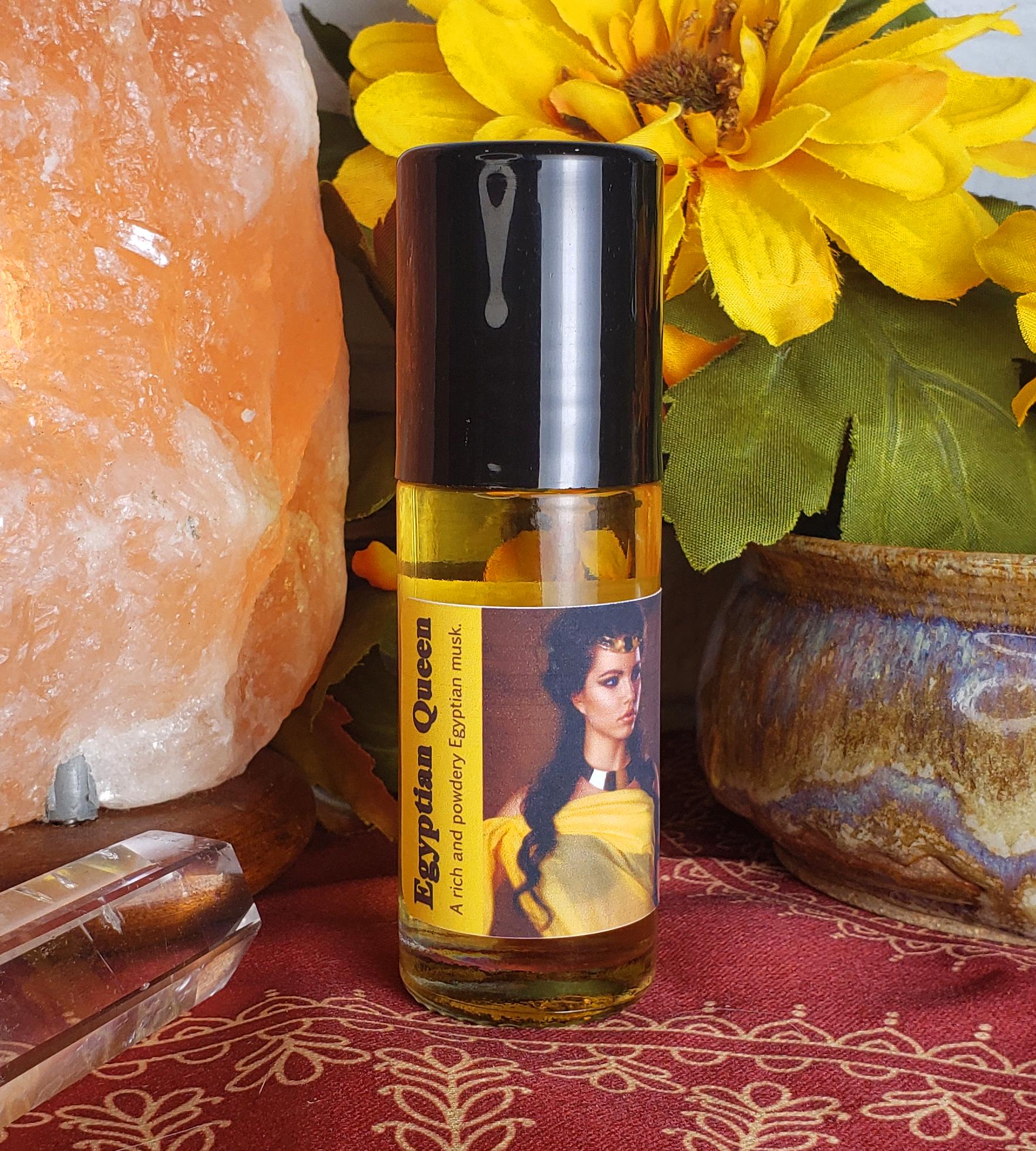 large one ounce bottle of egyptian queen perfume oil with cap on, egyptian musk scent
