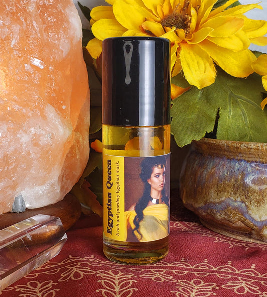 large one ounce bottle of egyptian queen perfume oil with cap on, egyptian musk scent