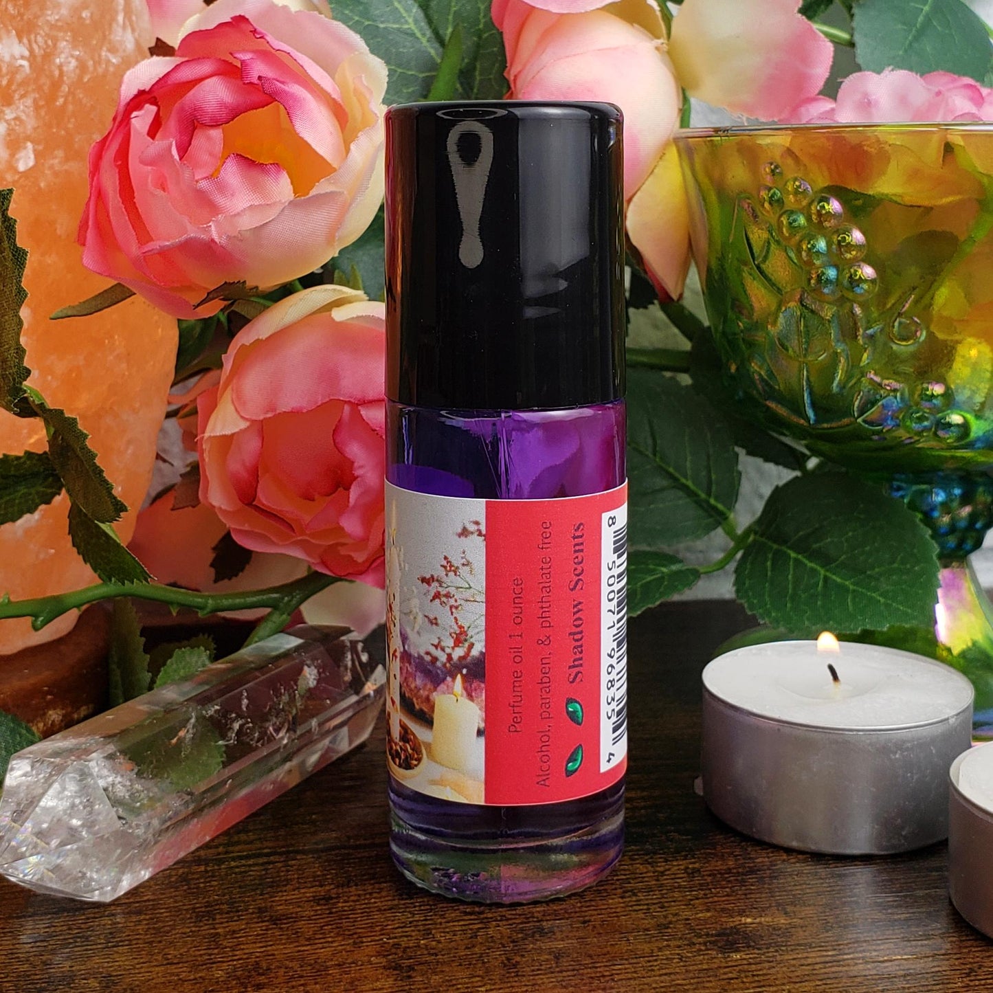 Larger 1 ounce bottle of love spell perfume oil by shadow scents, showing the back of the label and product specs