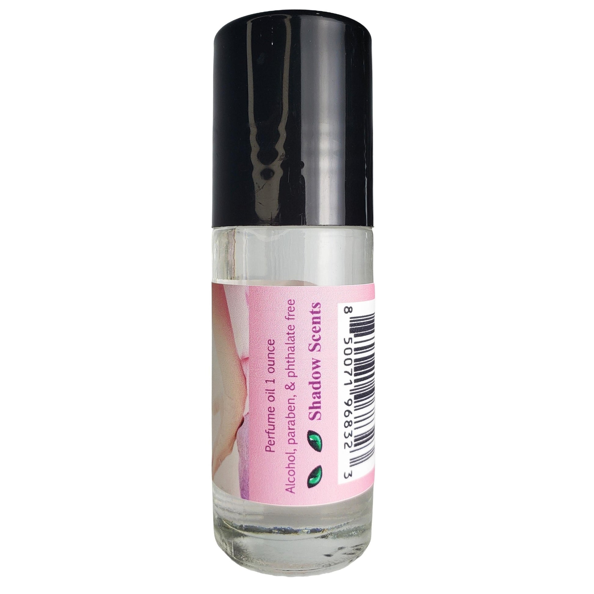 A 1-ounce clear glass roll-on bottle of perfume oil with a black cap and a pink label reading 'Shadow Scents'.